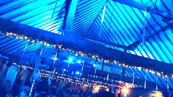 Blue-lights in ceiling from Sitewizard company Christmas party.